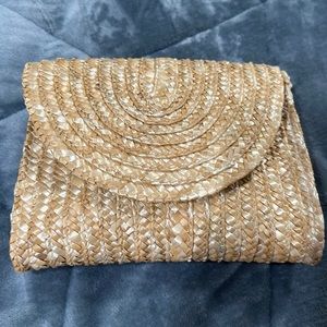 Brand new straw clutch bag.